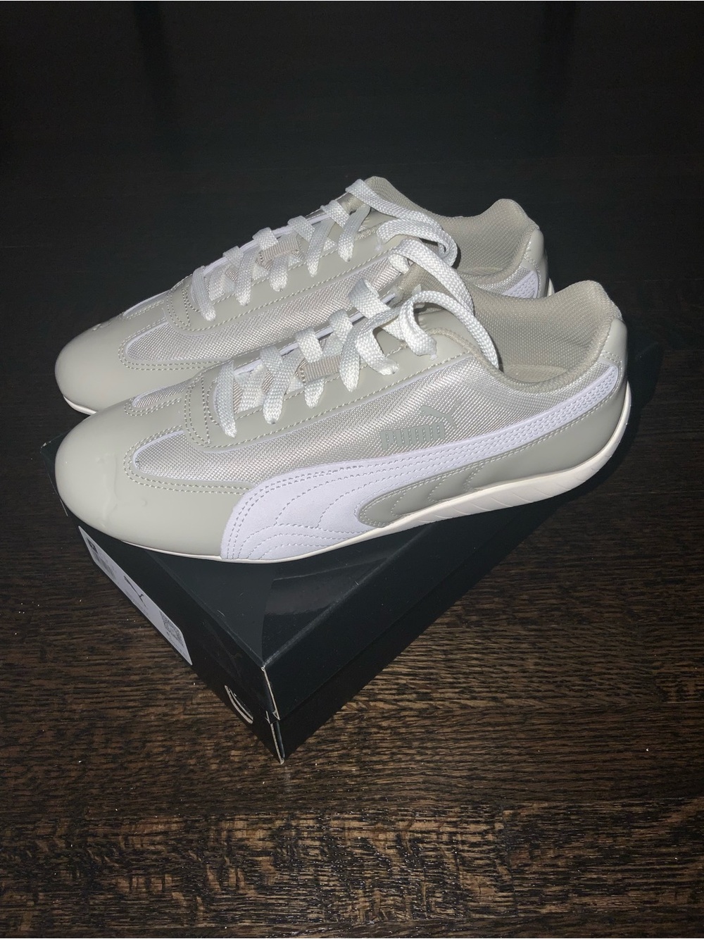 Puma woman’s Roma Trainers in Light Gray and White